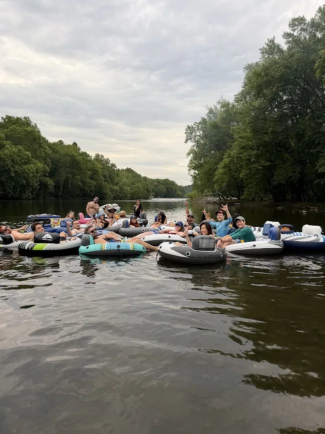 Wide flotilla raft-up on an overcast evening
